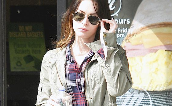 Candids of Megan Fox looking camel toey while leaving a coffee shop in LA