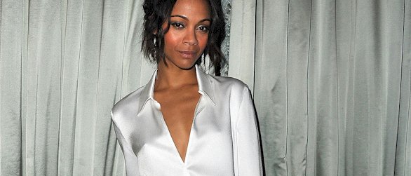 A braless Zoe Saldana attend the Michael Kors Dinner during Fashion Week in