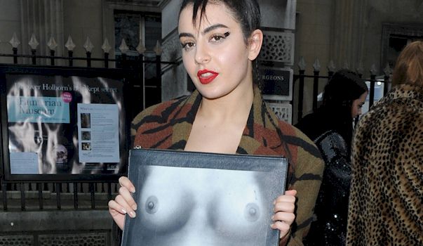 Here's Charli XCX holding a boob print outside Vivienne Westwood&a...