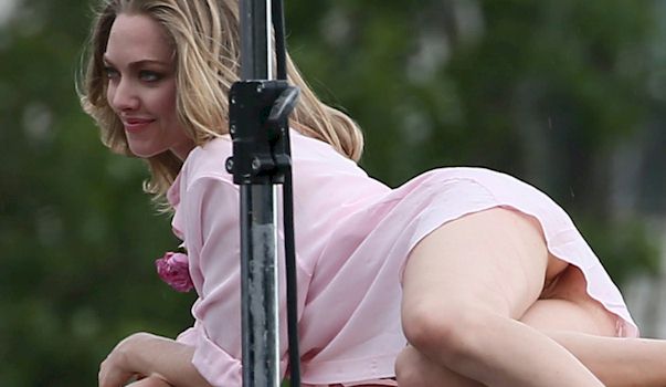 Behind the scenes shots of Amanda Seyfried flashing pussy while doing a pho...