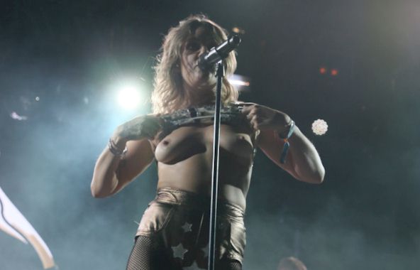 With topless lo exposes naked breasts tove bizarre Swedish singer
