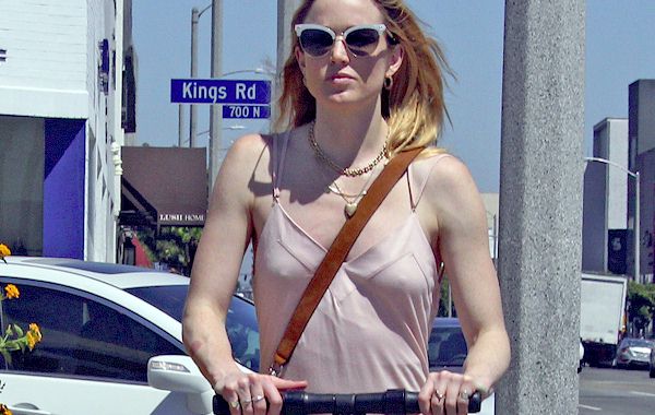 Caity Lotz Pokies while Riding a Scooter! 