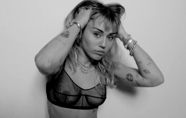 Miley Cyrus Black Porn - Miley Cyrus See Through to Promote a New Album! - The Nip Slip
