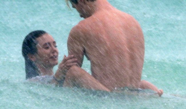 Are Nina Dobrev and Shaun White Having Sex in the Ocean? image