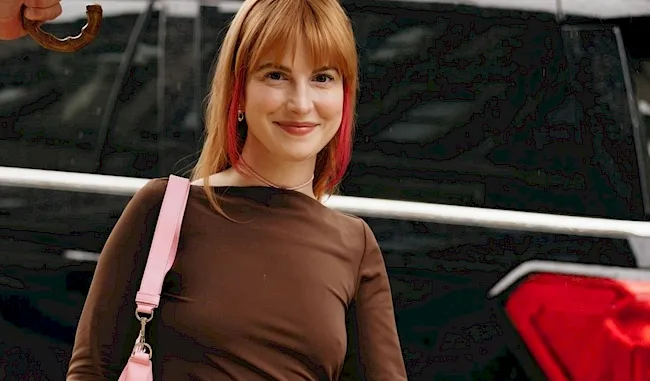 Hayley Williams braless in a tight dress