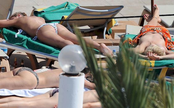 Topless Sunbathing Emmy Leaked Rossum