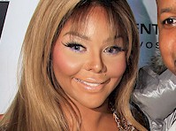 Well, Lil' Kim has definitely went waaay over the top with the pla...