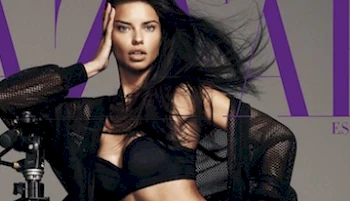 Model on the cover of a magazine wearing a bra