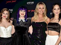 Ruby Modine and Rebecca Romijn