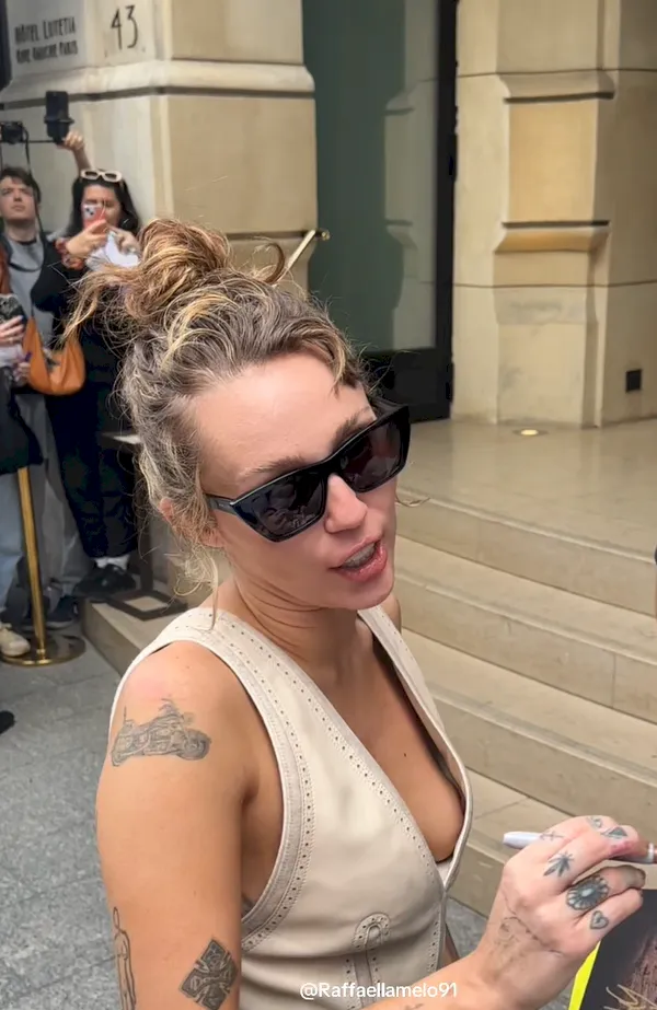 Miley Cyrus braless nip slip