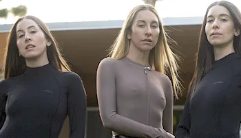 The girls from HAIM braless in wetsuits