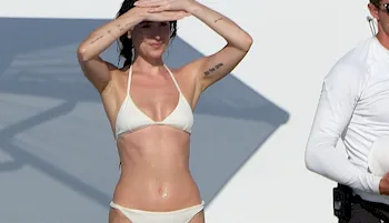 Dakota Johnson in a bikini on a boat