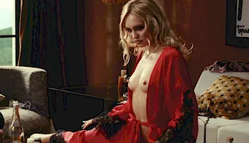Lily-Rose Depp topless in a red robe from The Idol