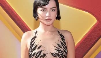 Isabela Merced on the red carpet in a sexy dress