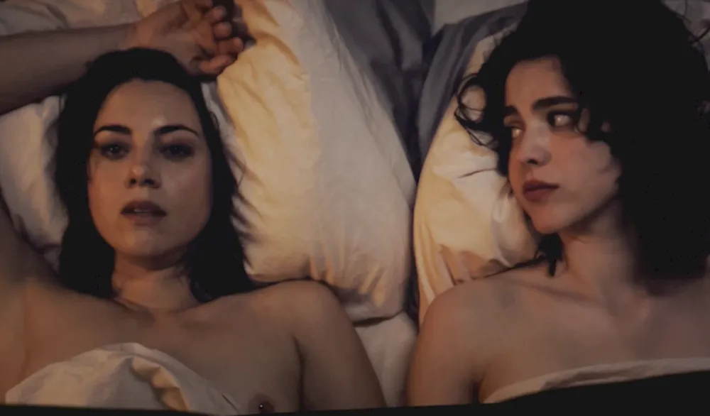 Margaret Qualley and Aubrey Plaza in bed together