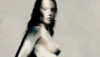 Miley Cyrus nude side boob in white body paint