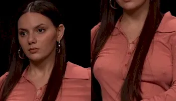 Pretty actress braless in a pink top