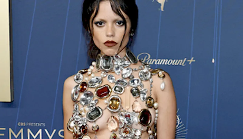 Jenna Ortega topless and wearing big jewelry