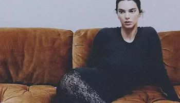 Kendall Jenner on her side in lace leggings