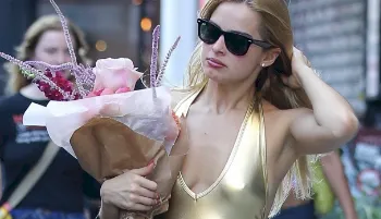 Addison Rae out and about in a gold top