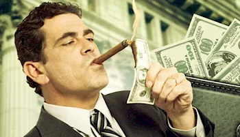 Man in a suit lighting his cigar with a 100 dollar bill