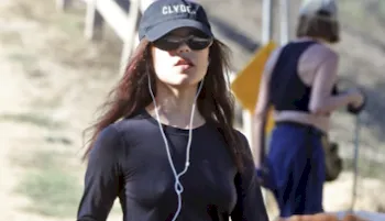 Jenna Ortega being incognito in sun glasses and baseball cap