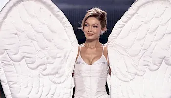 Gigi Hadid wearing bit angel wings on the runway