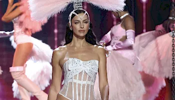 Irina Shays in lingerie on the runway
