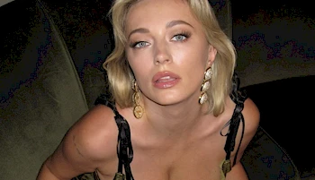 Caroline Vreeland looking up seductively into the camera