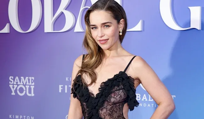 Cropped view of Emilia Clarke at an angle and posing on the red carpet