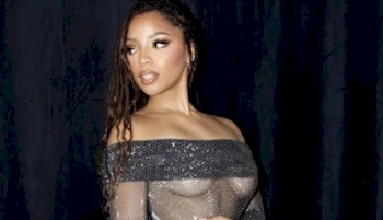 Cropped view of Chloe Bailey looking behind her