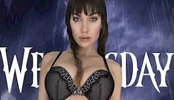 Close up of woman with braids wearing a bra