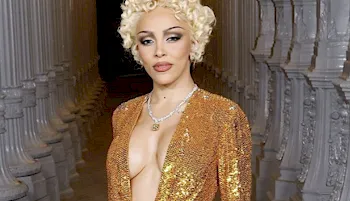 Cropped view of Doja Cat wearing a deep plunging dress