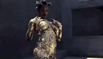 Teyana Taylor nude and covered in gold flakes