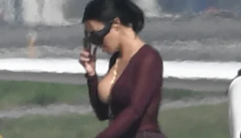 Kim Kardashian Sideboob When Stepping Off a Plane!