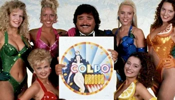 Vintage TV host posing among beautiful women