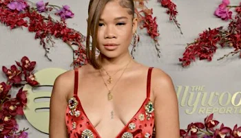 Close up of Storm Reid facing the camera while posing on the red carpet