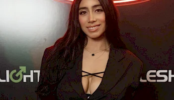 Close up of woman smiling on a red carpet
