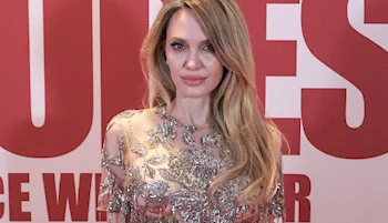 Close up of Angela Jolie posing on a red carpet