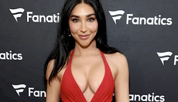 Close up of exotic woman showing cleavage and smiling
