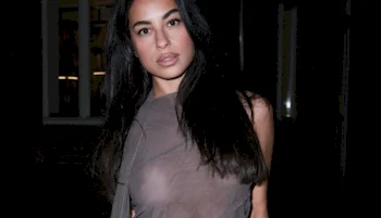 Close up of middle eastern woman in a sheer dress