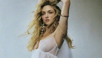 Close up of woman striking a pose wearing a sheer nightie