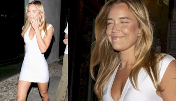 Woman in white dress smiling