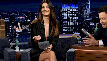 Woman smiling on talk show set