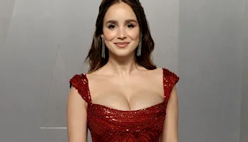 Woman in red sequined dress