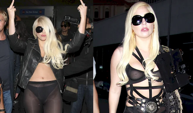 Two images of a woman with long blonde hair and sunglasses wearing revealing black outfits; in one, she raises both middle fingers, and in the other, she stands with a serious expression.