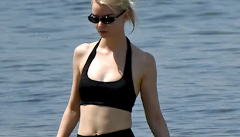 Anya Taylor-Joy In Modest Black Bikini At The Beach!