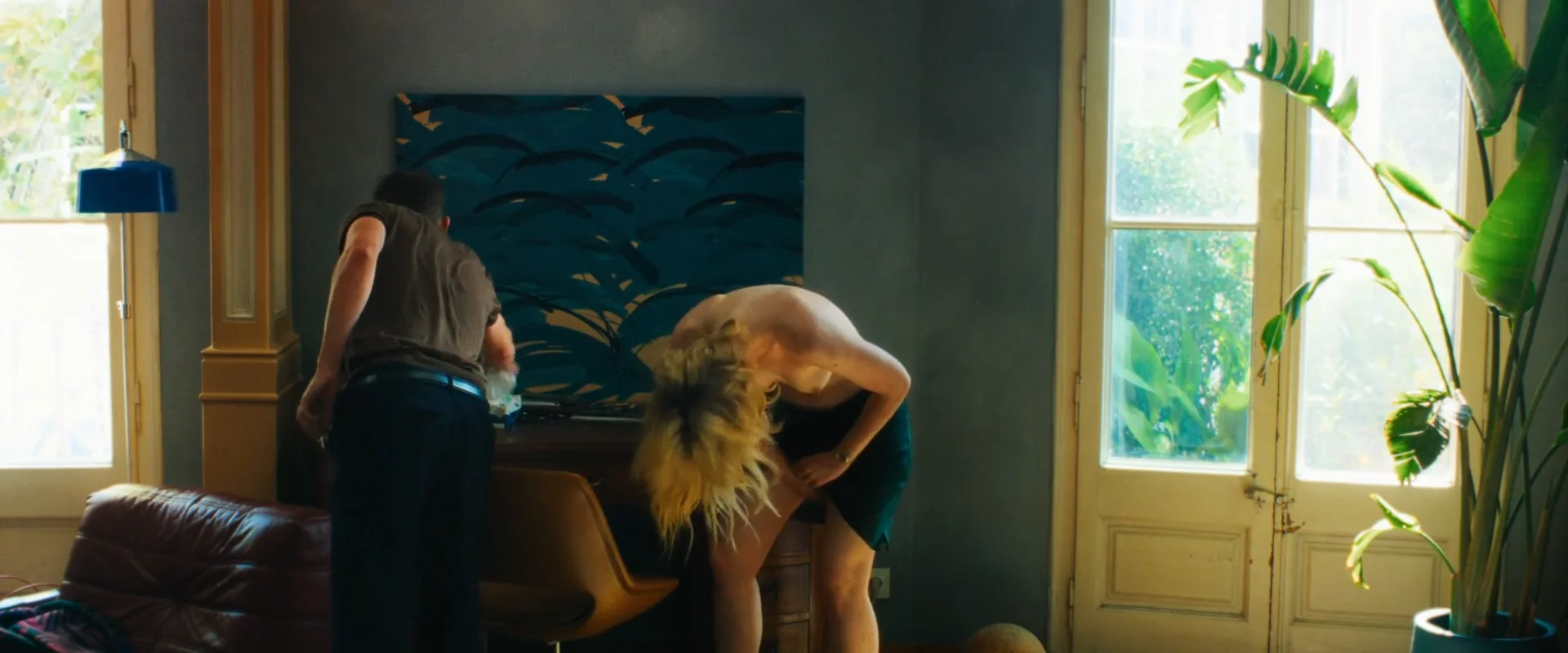 Elle-Fanning-Topless-Rosebush-Pruning5 Elle Fanning topless and bent over, appearing to clean her crotch in front of a desk.