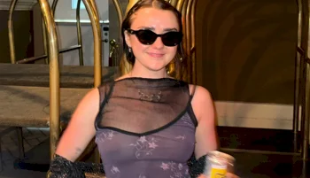 Maisie Williams In See Through Purple Top!