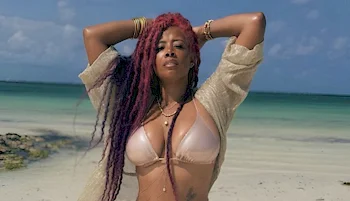 Kelis Promote Sunscreen In Bikinis!